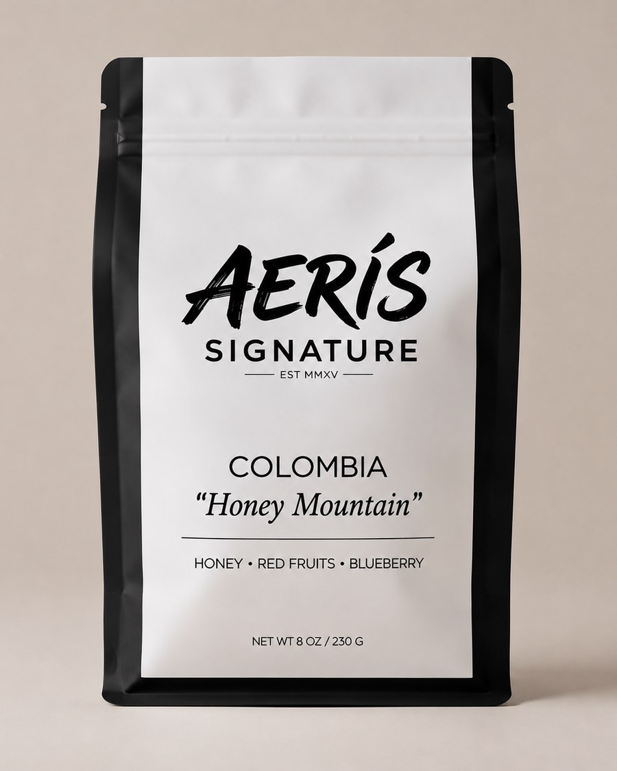 Colombia Honey Mountain — Aerís Signature pack, white bag with black gussets, whole bean